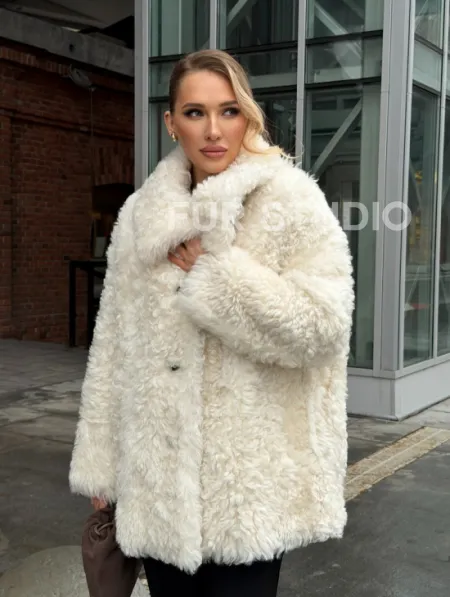 Белая шубка из тиградо - фото 15